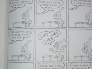 Sorry for the crappy image quality; photo by me, cartoon by the too brilliant for words Matt Groening.
