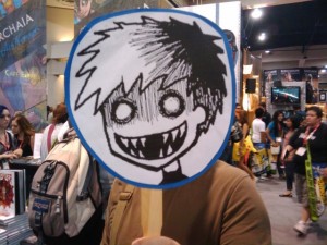 The most pleasant person I met at Comic-Con: Tom Siddell of Gunnerkrigg Court, shown here in a candid photo during a signing.